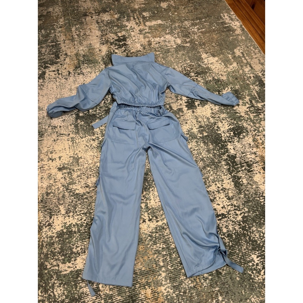 Loragal Womens 2 piece pant/jacket suit light blue size Large